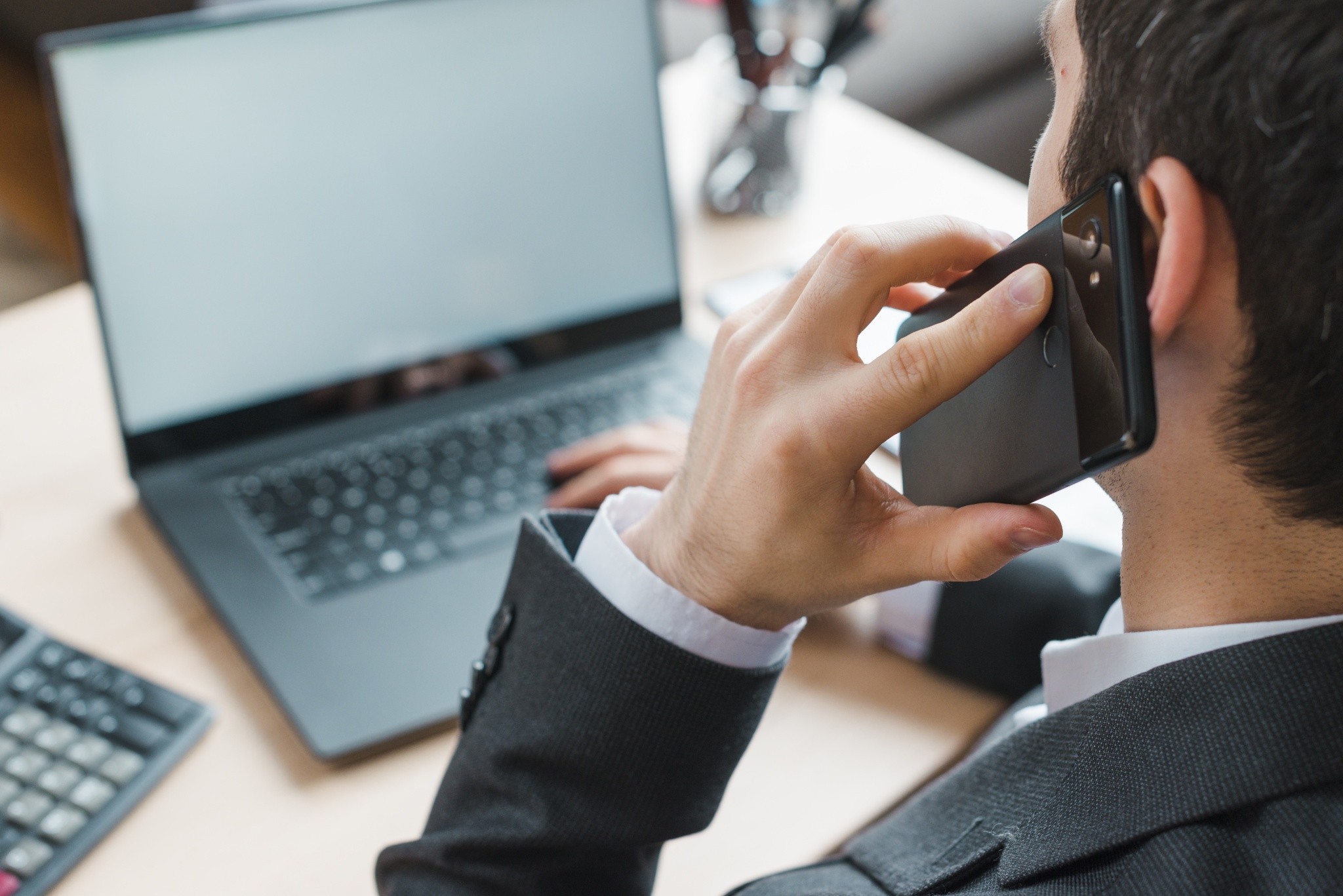 office desktop with laptop business man 2048x1367 1